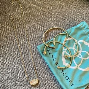 Kendra Scott necklace and bracelets.